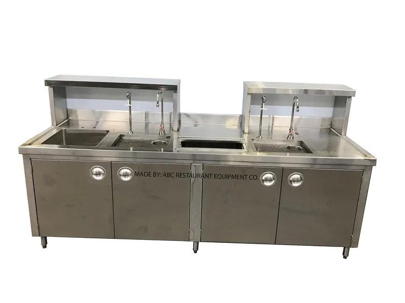 Custom stainless steel twin-basin sink counter with raised faucet shelf