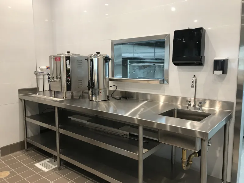 Custom stainless steel water and beverage station with hand sink