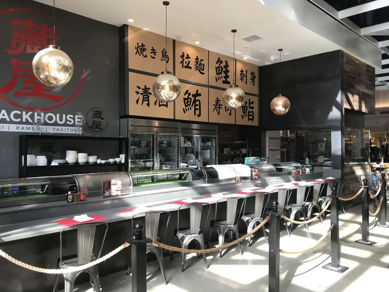 Back House Japanese Restaurant sushi and ramen service counter with refrigerated cases