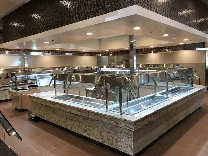 Four Seasons Buffet custom stainless steel steam table line with glass sneeze guards
